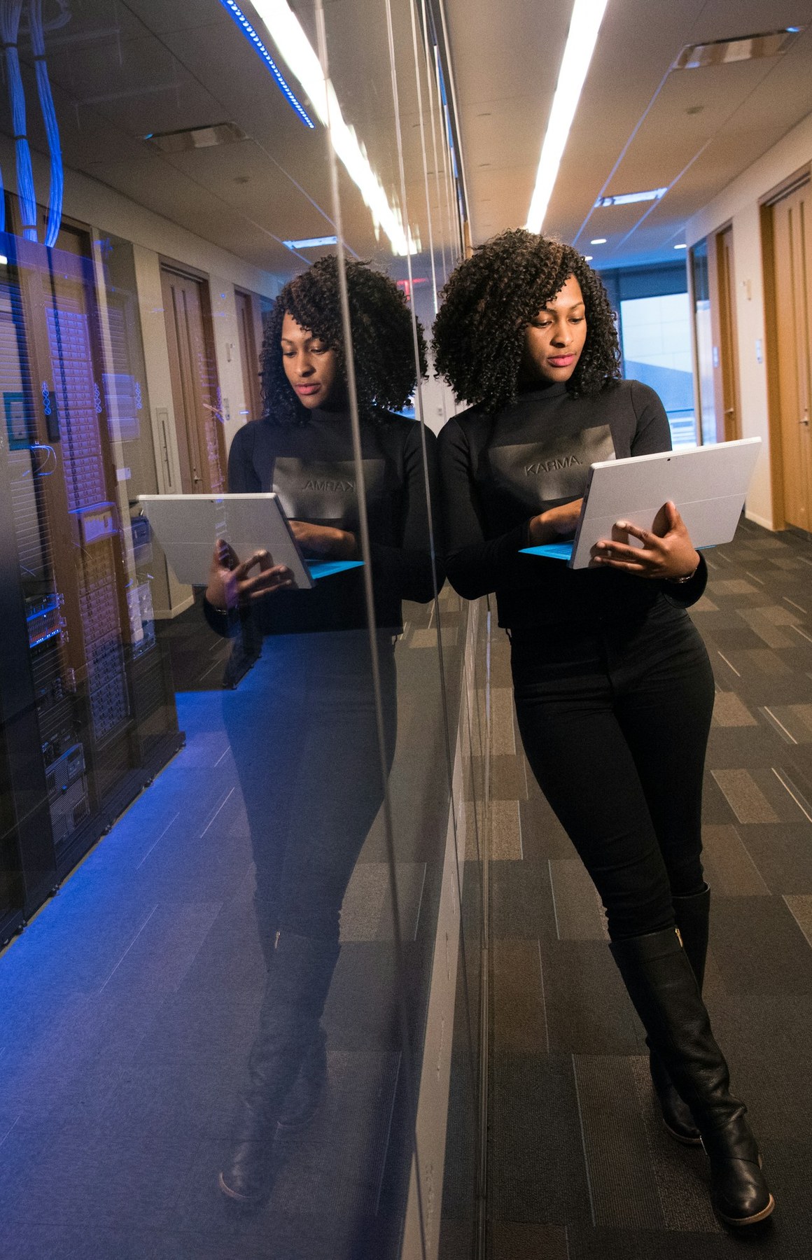 Cybersecurity professional reviewing systems in a data centre